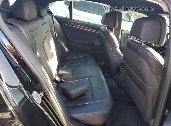 WBA13BK0XPCL16340 2023 BMW M5 Black Rear seats view