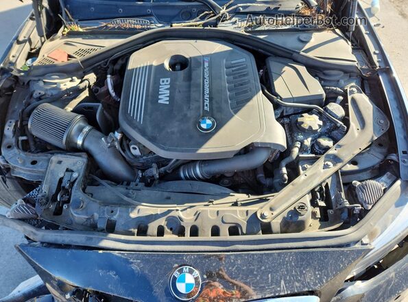 WBA2N3C50JVC29432 2018 BMW M2 Black Vista interior trasera