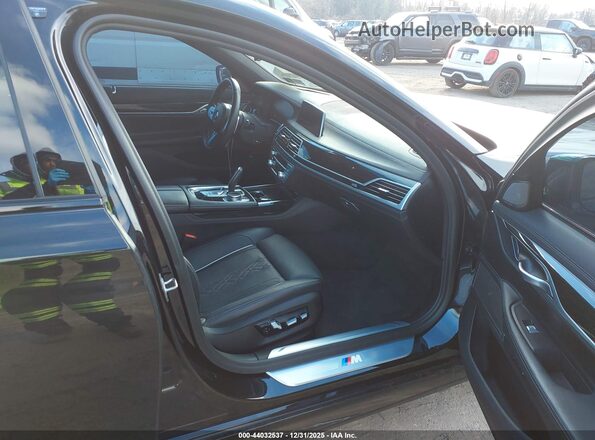 WBA7T2C04NCK08799 2022 BMW OTHER Черный Вид салона спереди