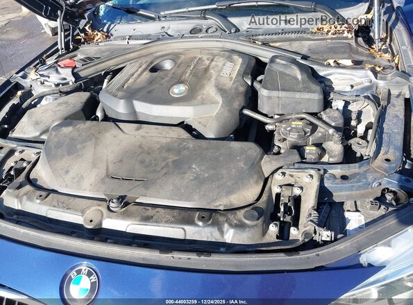 WBA8D9C5XJEM32793 2018 BMW OTHER Blue Vista trasera