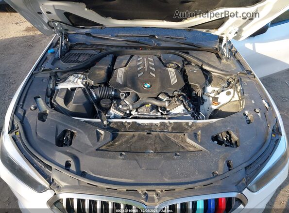 WBAGV8C02LCE29007 2020 BMW OTHER White Vista trasera