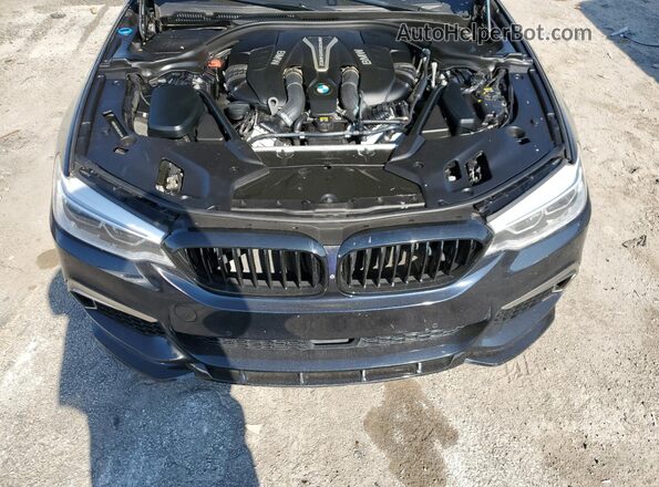WBAJB9C58JB036449 2018 BMW M5 Black Սալոնի հետևի տեսք