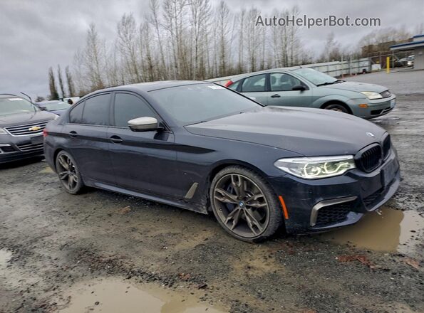 WBAJB9C58KB287666 2019 BMW M5 Blue Front right