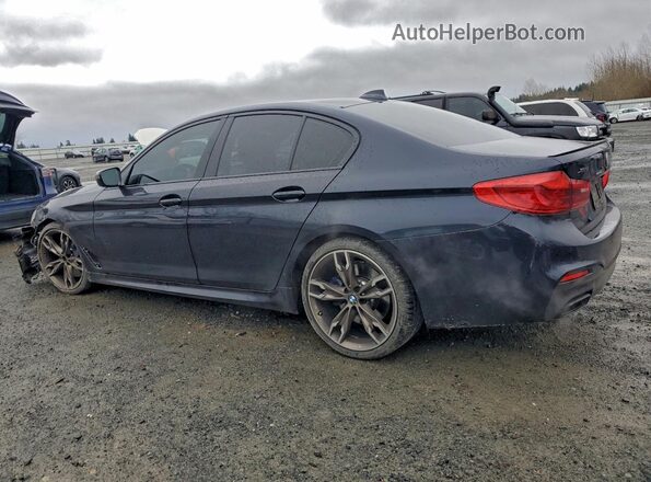 WBAJB9C58KB287666 2019 BMW M5 Blue Rear left