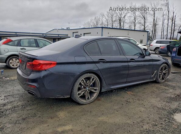 WBAJB9C58KB287666 2019 BMW M5 Blue Rear right