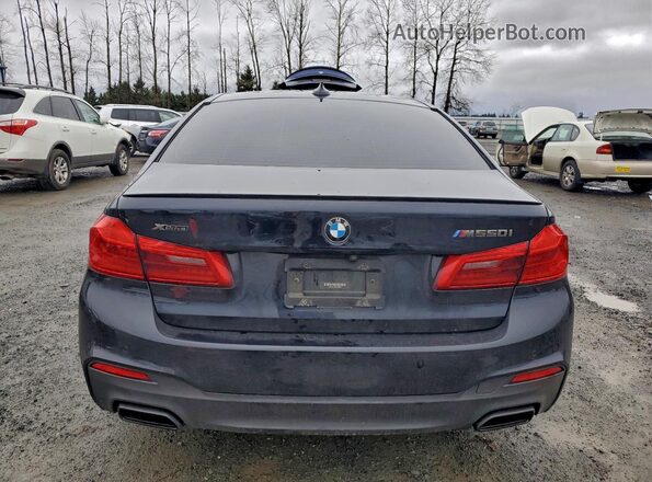 WBAJB9C58KB287666 2019 BMW M5 Blue Rear view