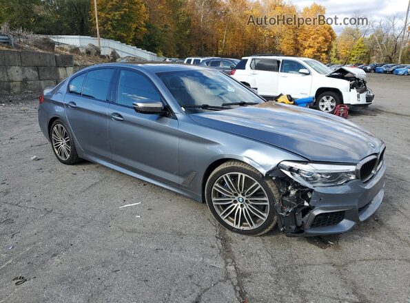 WBAJB9C58KB464877 2019 BMW M5 Серебряный Передняя правая четверть