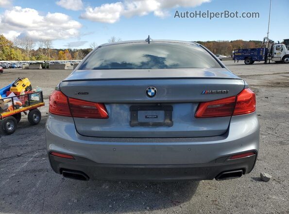 WBAJB9C58KB464877 2019 BMW M5 Серебряный Вид сзади
