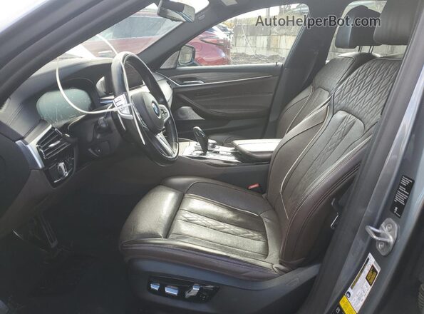 WBAJB9C58KB464877 2019 BMW M5 Серебряный Вид салона спереди