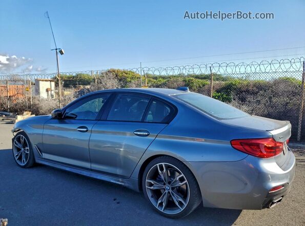WBAJB9C59JB049727 2018 BMW M5 Синий Задняя левая четверть