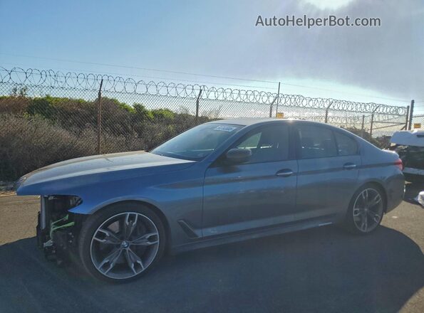 WBAJB9C59JB049727 2018 BMW M5 Синий Передняя левая четверть