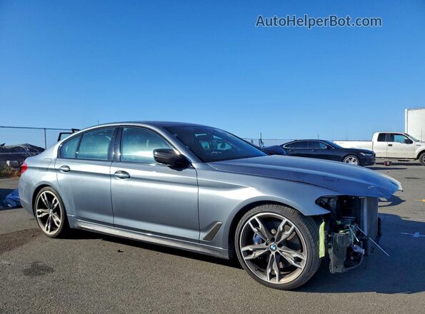 WBAJB9C59JB049727 2018 BMW M5 Синий Передняя правая четверть