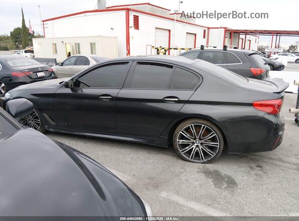 WBAJB9C5XJB034766 2018 BMW 5 SERIES Черный Вид задней части салона