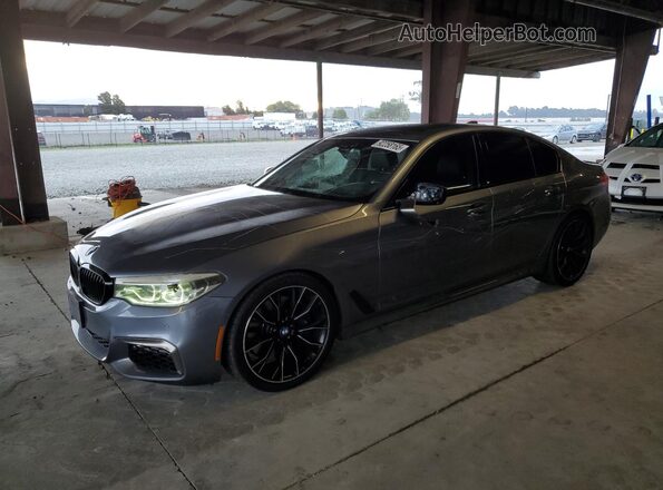 WBAJB9C5XKB288432 2019 BMW M5 Gray Առջևի ձախ երեք քառորդ տեսարան