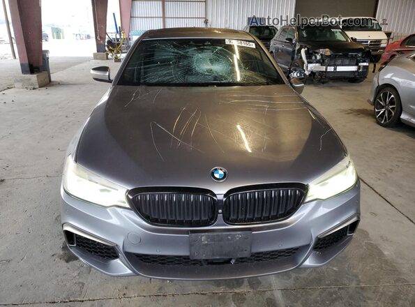 WBAJB9C5XKB288432 2019 BMW M5 Gray Դիմացի տեսք
