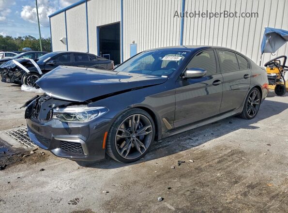 WBAJS7C03LCE13617 2020 BMW M5 Gray Առջևի ձախ երեք քառորդ տեսարան