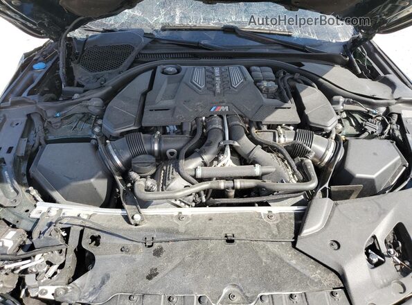 WBS83CH00PCN13394 2023 BMW M5 Зеленый Вид задней части салона