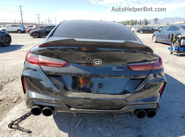 WBSGV0C09RCN76816 2024 BMW M8 Black Rear view