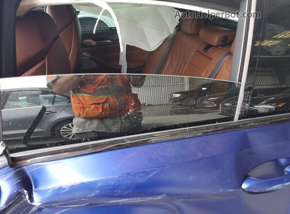 WBSJF0C55KB448437 2019 BMW M5 Blue Vista de los asientos traseros