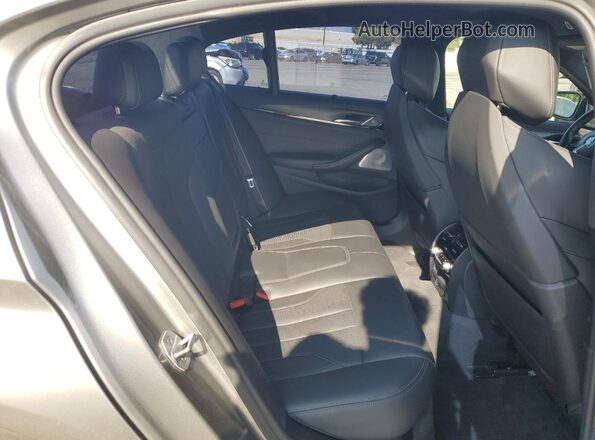WBSJF0C57KB284589 2019 BMW M5 Silver Vista de los asientos traseros