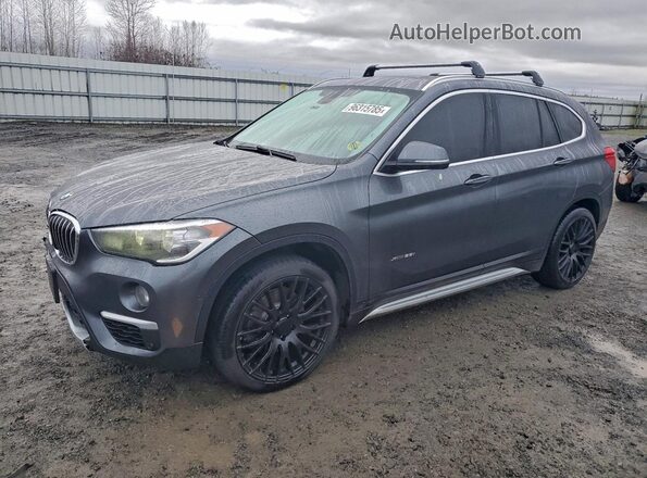 WBXHT3C37H5F74147 2017 BMW X1 Серый Передняя левая четверть