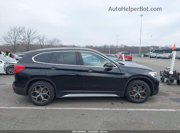 WBXHT3C52K5L37748 2019 BMW X1 Черный Вид задней части салона