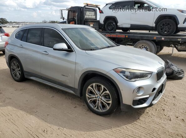 WBXHT3Z36G4A49348 2016 BMW X1 Серебряный Передняя правая четверть