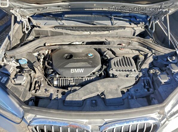 WBXHT3Z36G4A49348 2016 BMW X1 Серебряный Вид задней части салона