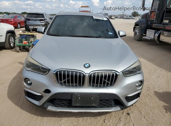 WBXHT3Z36G4A49348 2016 BMW X1 Серебряный Вид спереди