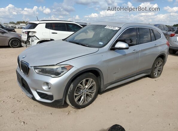 WBXHT3Z36G4A49348 2016 BMW X1 Серебряный Передняя левая четверть