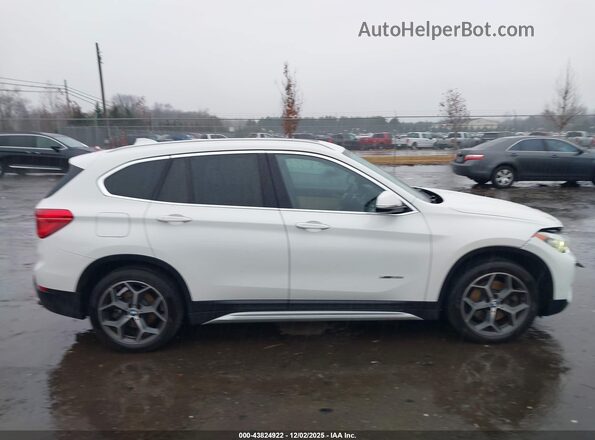 WBXHT3Z38H4A53600 2017 BMW X1 Белый Вид задней части салона