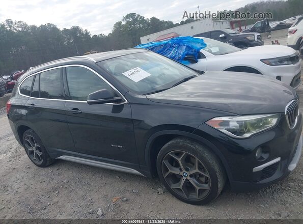 WBXHT3Z39G4A51238 2016 BMW X1 Черный Вид задней части салона