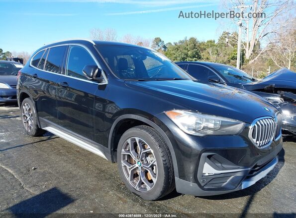 WBXJG9C06L5P73873 2020 BMW X1 Black Front right