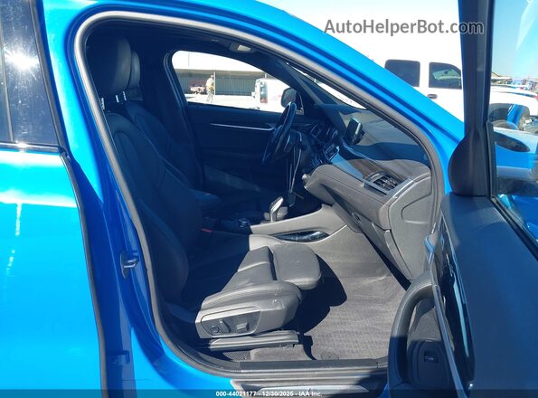 WBXYH9C04P5V31469 2023 BMW X2 Синий Вид салона спереди
