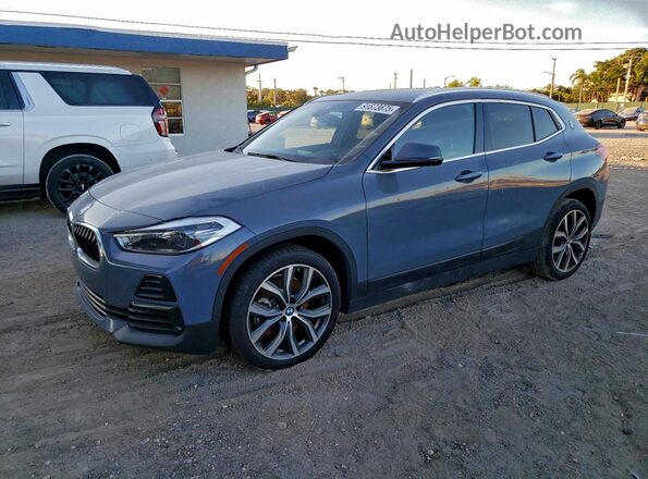 WBXYH9C05M5S06597 2021 BMW X2 Gray Vista tres cuartos delantera izquierda