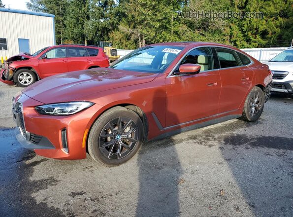 WBY43AW00PFP86510 2023 BMW I4 Orange Առջևի ձախ երեք քառորդ տեսարան