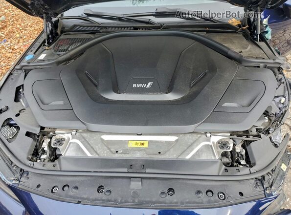 WBY73AW00NFN24240 2022 BMW I4 Синий Вид задней части салона