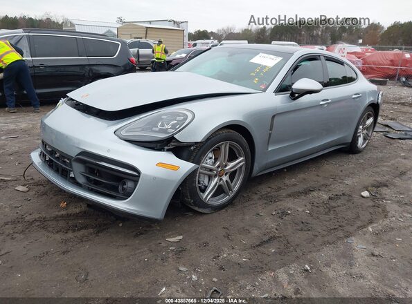 WP0AJ2A75PL101018 2023 PORSCHE PANAMERA Blue Vista tres cuartos delantera izquierda