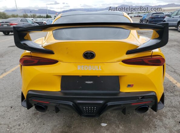 WZ1DB4C05LW023680 2020 TOYOTA SUPRA Yellow Widok z tyłu