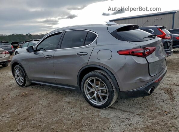ZASFAKBN6J7C01591 2018 ALFA ROMEO STELVIO Gray Trasero izquierdo