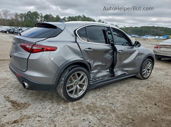 ZASFAKBN6J7C01591 2018 ALFA ROMEO STELVIO Gray Trasero derecho