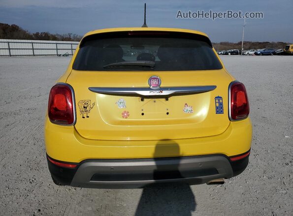 ZFBCFXCT6GP389936 2016 FIAT 500X Yellow Вид ззаду