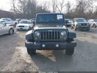 2016 Jeep Wrangler Unlimited Sport Green vin: 1C4BJWDG6GL125125