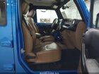 2016 Jeep Wrangler Unlimited Sahara Blue vin: 1C4BJWEG9GL158702 2016 Jeep Wrangler Unlimited Sahara Blue vin: 1C4BJWEG9GL158702