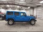 2016 Jeep Wrangler Unlimited Sahara Blue vin: 1C4BJWEG9GL158702 2016 Jeep Wrangler Unlimited Sahara Blue vin: 1C4BJWEG9GL158702