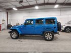 2016 Jeep Wrangler Unlimited Sahara Blue vin: 1C4BJWEG9GL158702 2016 Jeep Wrangler Unlimited Sahara Blue vin: 1C4BJWEG9GL158702