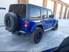 2019 Jeep Wrangler Unlimited Sahara 4x4 Синий vin: 1C4HJXEN6KW501830