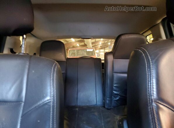 1C4NJCEA4GD738148 2016 JEEP COMPASS Black Vista de los asientos traseros