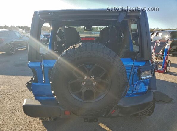 1C4PJXDNXTW156672 2026 JEEP WRANGLER Синий Вид сзади