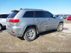 2019 Jeep Grand Cherokee Laredo E 4x2 Серебряный vin: 1C4RJEAGXKC857540